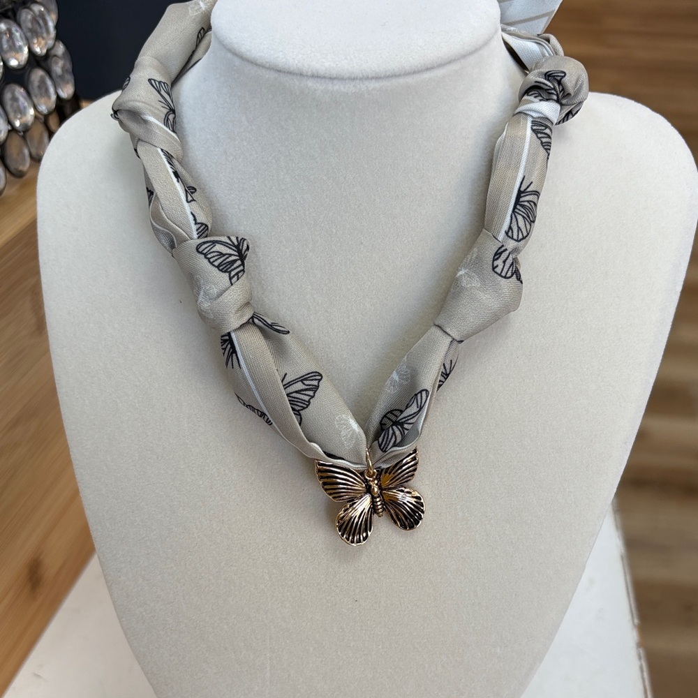 Elegant Butterfly Pendant Necklace in Silver and Gold